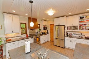 Custom kitchen in a modular ranch home by Saratoga Modular Homes
